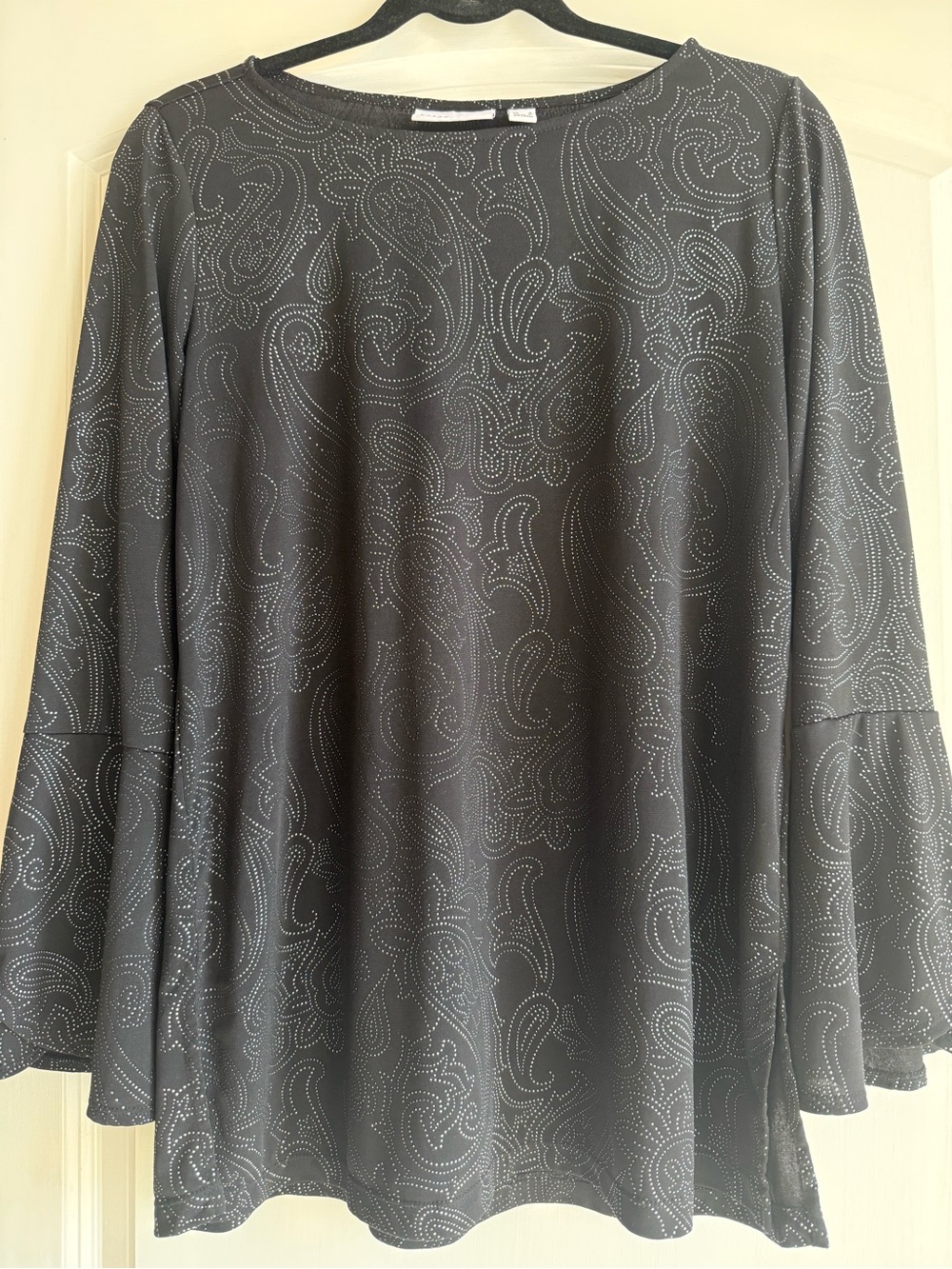 Women’s Black Paisley-Print Long Sleeve Tunic. Fabric is wrinkle free